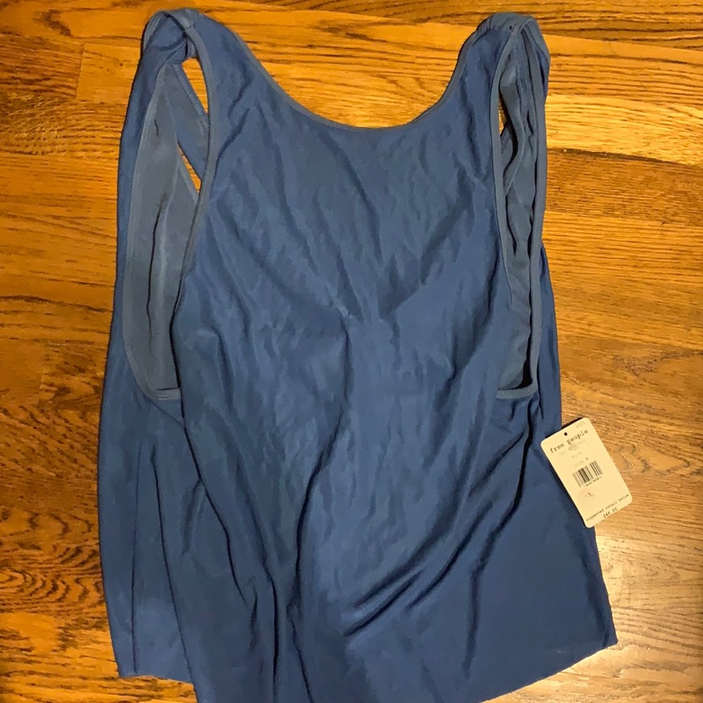 Cute free people tank with open back.